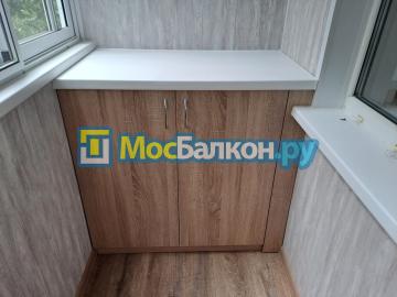 Тумба из ДСП на балконе под подоконником