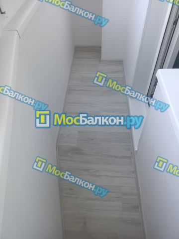 Отделка балкона и лоджии пластиковыми ПВХ панелями в Долгопрудном от компании МосБалкон