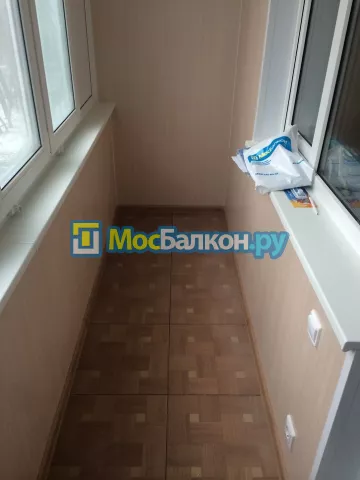 Отделка балкона и лоджии пластиковыми ПВХ панелями в Долгопрудном от компании МосБалкон